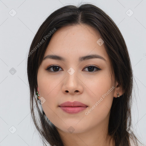 Joyful asian young-adult female with long  brown hair and brown eyes