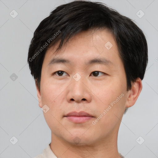 Neutral asian young-adult male with short  brown hair and brown eyes