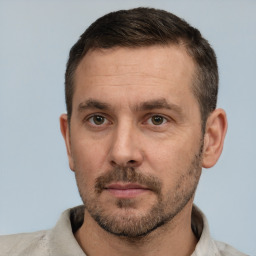 Neutral white adult male with short  brown hair and brown eyes