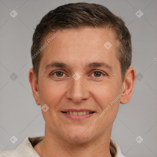 Joyful white adult male with short  brown hair and brown eyes