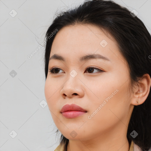 Neutral asian young-adult female with medium  brown hair and brown eyes