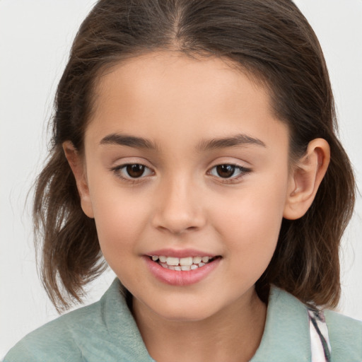 Joyful white child female with medium  brown hair and brown eyes