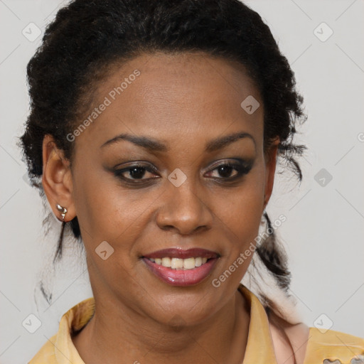 Joyful black young-adult female with medium  brown hair and brown eyes