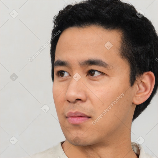 Neutral asian young-adult male with short  black hair and brown eyes