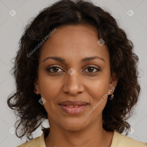 Joyful black young-adult female with medium  brown hair and brown eyes