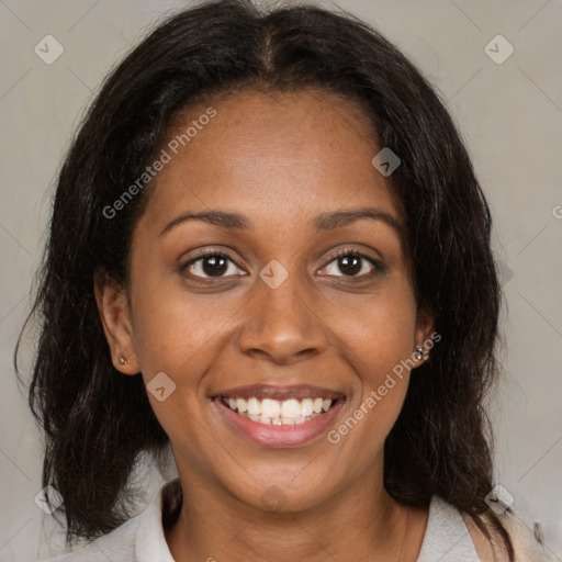 Joyful black young-adult female with medium  brown hair and brown eyes