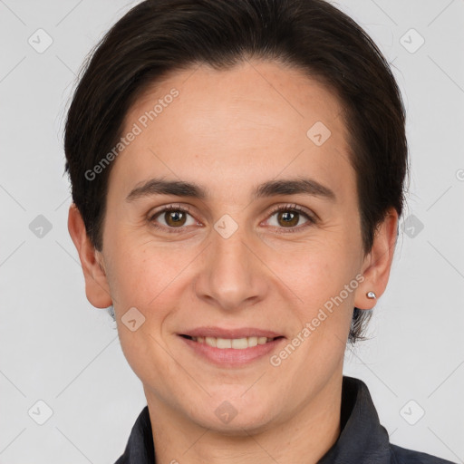 Joyful white adult female with short  brown hair and brown eyes