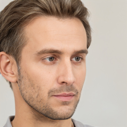 Neutral white young-adult male with short  brown hair and brown eyes