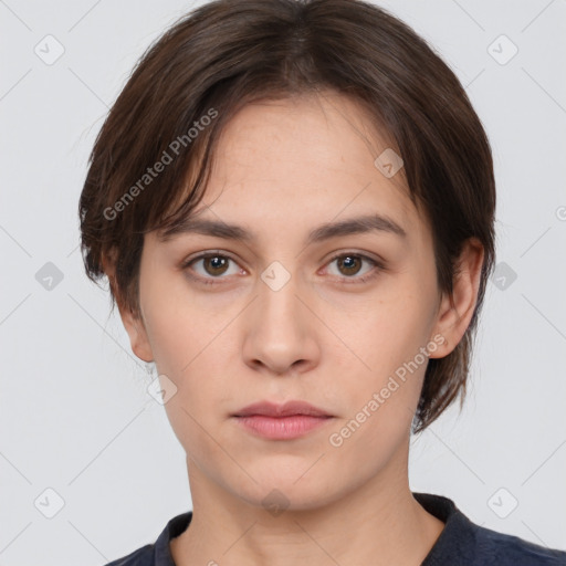 Neutral white young-adult female with short  brown hair and brown eyes