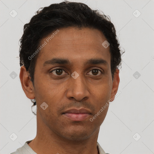 Neutral black young-adult male with short  brown hair and brown eyes