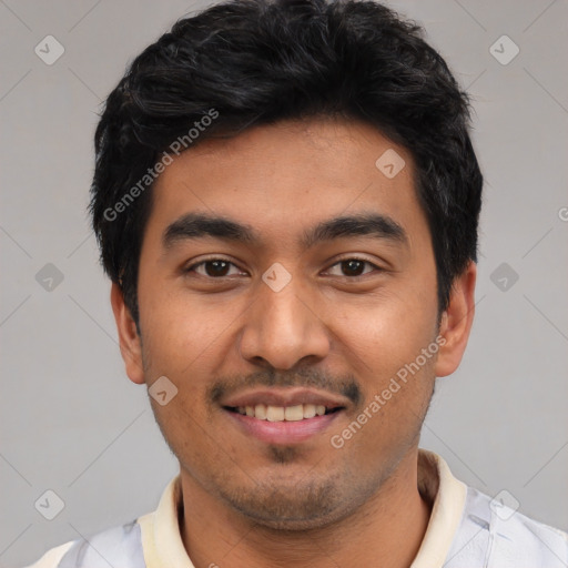 Joyful latino young-adult male with short  black hair and brown eyes