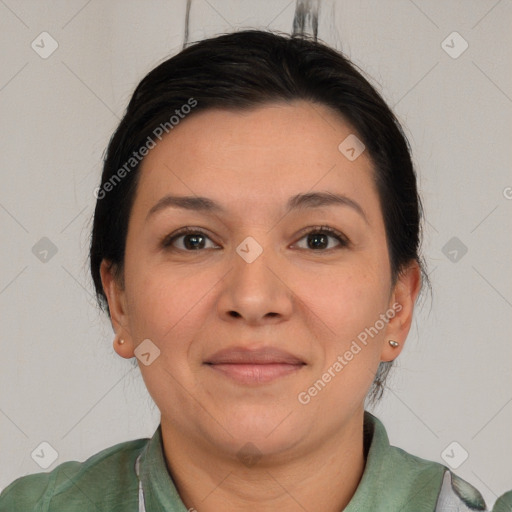 Joyful white adult female with short  brown hair and brown eyes