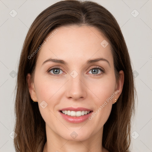 Joyful white young-adult female with medium  brown hair and grey eyes