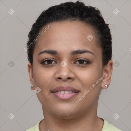 Joyful latino young-adult female with short  brown hair and brown eyes