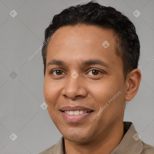 Joyful white adult male with short  brown hair and brown eyes