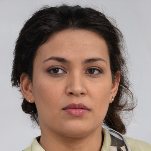 Neutral white young-adult female with medium  brown hair and brown eyes