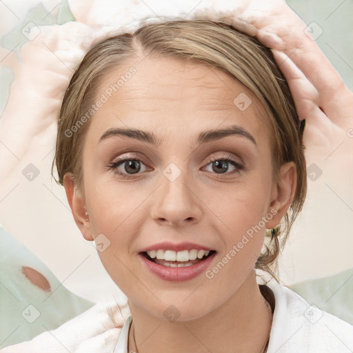 Joyful white young-adult female with medium  brown hair and brown eyes