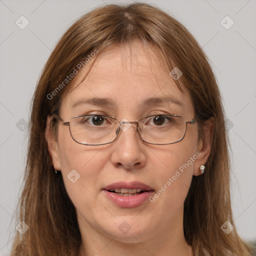 Joyful white adult female with long  brown hair and brown eyes