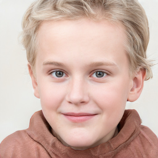 Joyful white child female with short  brown hair and blue eyes