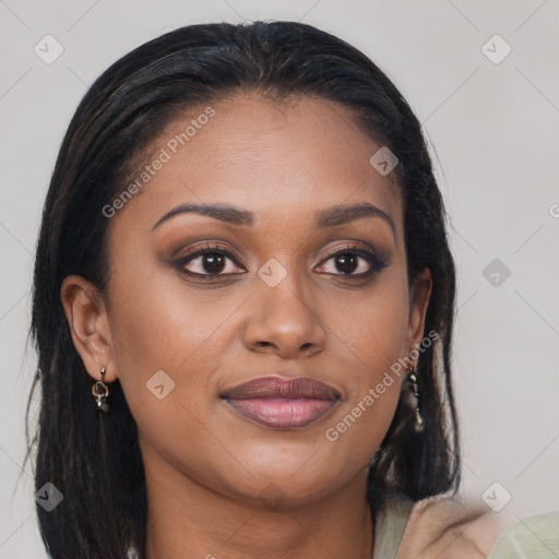 Joyful black young-adult female with long  brown hair and brown eyes
