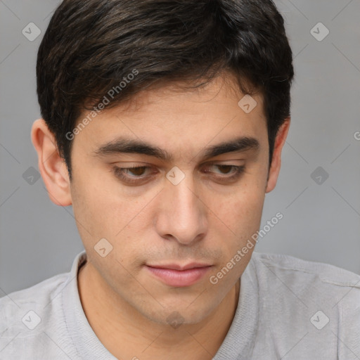 Neutral white young-adult male with short  brown hair and brown eyes