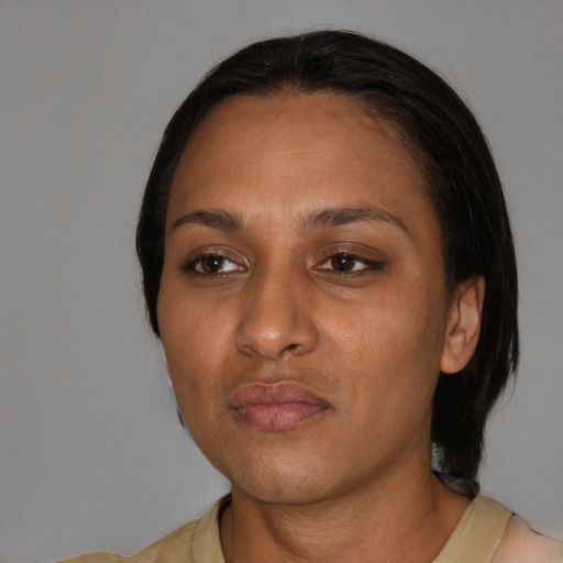 Neutral black adult female with medium  black hair and brown eyes