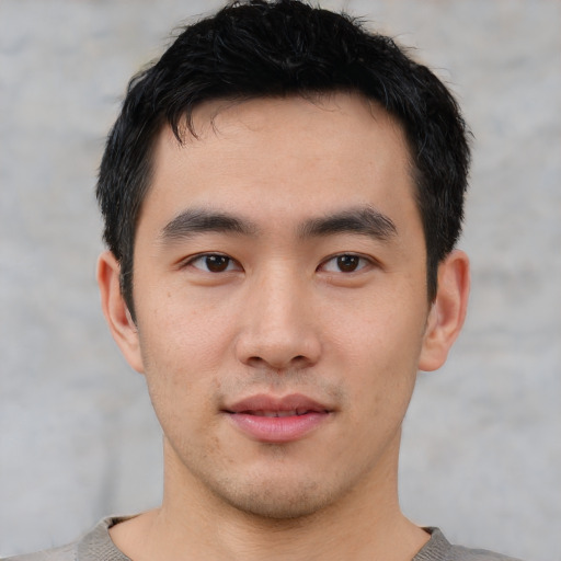 Neutral asian young-adult male with short  black hair and brown eyes