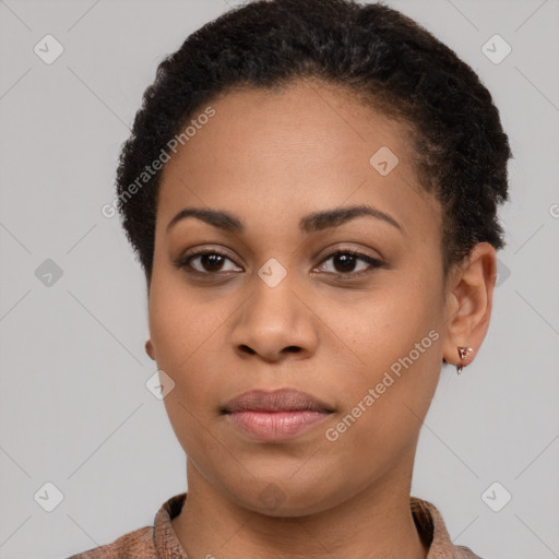 Neutral black young-adult female with short  brown hair and brown eyes