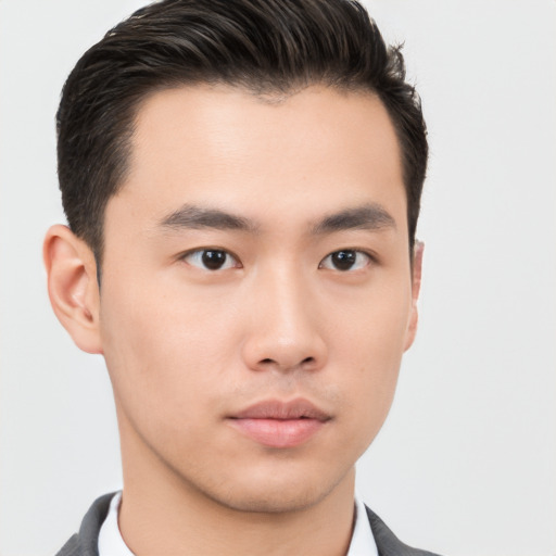 Neutral asian young-adult male with short  brown hair and brown eyes