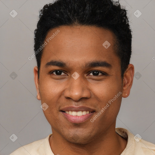 Joyful black young-adult male with short  black hair and brown eyes