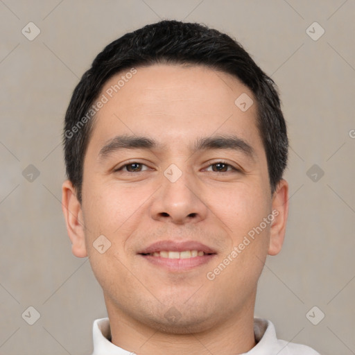 Joyful white young-adult male with short  black hair and brown eyes