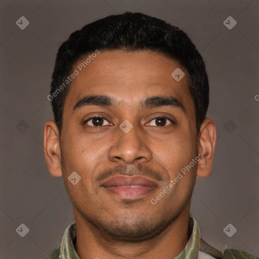 Joyful latino young-adult male with short  brown hair and brown eyes