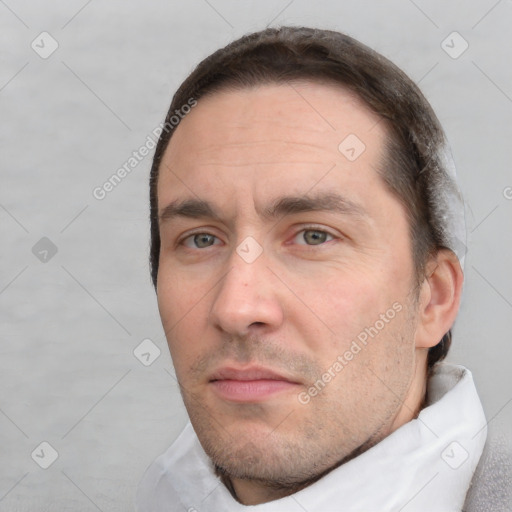 Neutral white adult male with short  brown hair and brown eyes