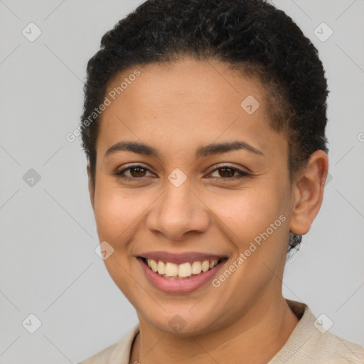 Joyful latino young-adult female with short  brown hair and brown eyes