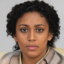 Neutral black young-adult female with short  brown hair and brown eyes