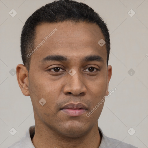 Neutral latino young-adult male with short  black hair and brown eyes