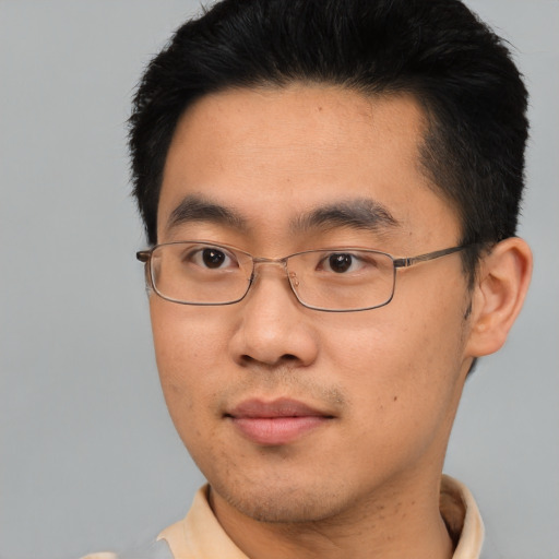 Neutral asian young-adult male with short  brown hair and brown eyes