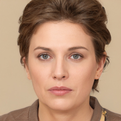 Neutral white young-adult female with short  brown hair and brown eyes