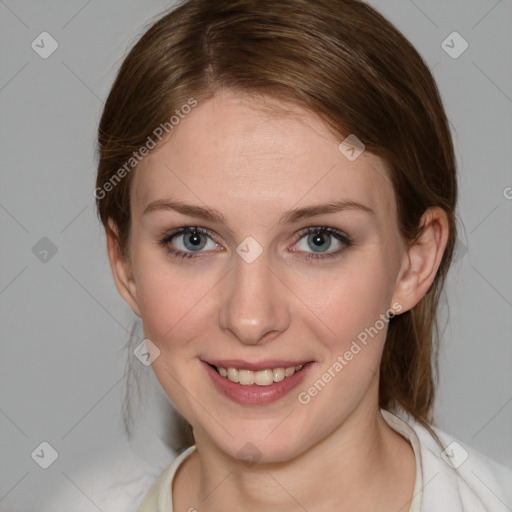 Joyful white young-adult female with medium  brown hair and blue eyes