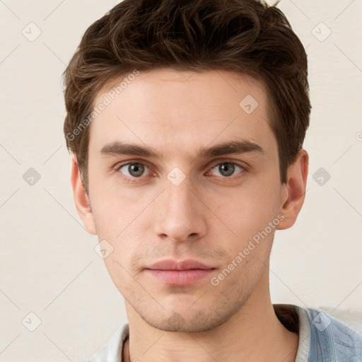 Neutral white young-adult male with short  brown hair and grey eyes