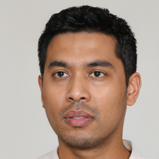 Neutral latino young-adult male with short  black hair and brown eyes