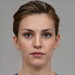 Neutral white young-adult female with short  brown hair and brown eyes