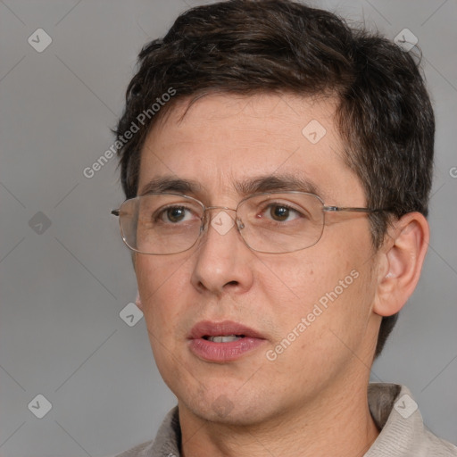 Neutral white adult male with short  brown hair and brown eyes