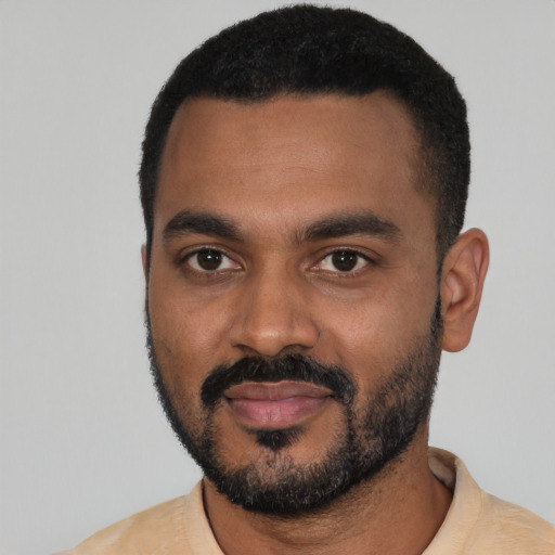 Neutral black young-adult male with short  black hair and brown eyes
