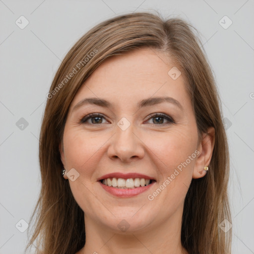 Joyful white young-adult female with long  brown hair and grey eyes