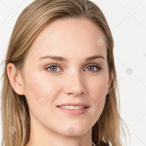 Joyful white young-adult female with long  brown hair and blue eyes