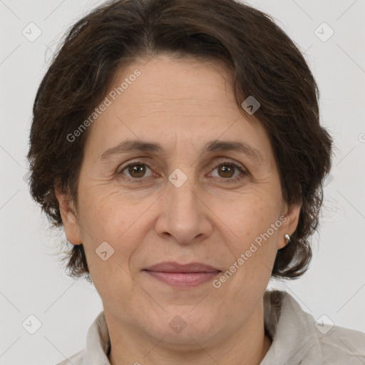 Joyful white adult female with short  brown hair and brown eyes