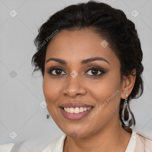 Joyful latino young-adult female with medium  brown hair and brown eyes