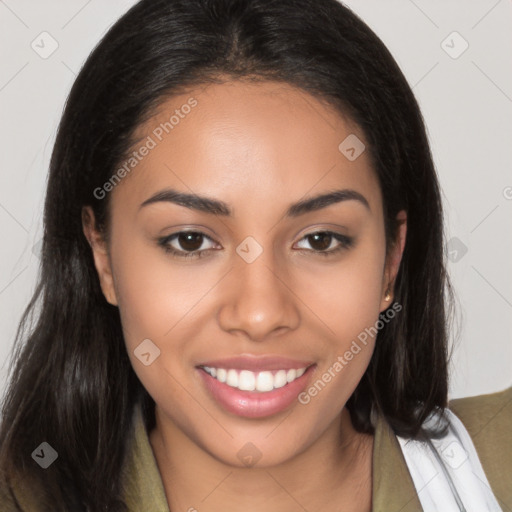 Joyful latino young-adult female with long  brown hair and brown eyes