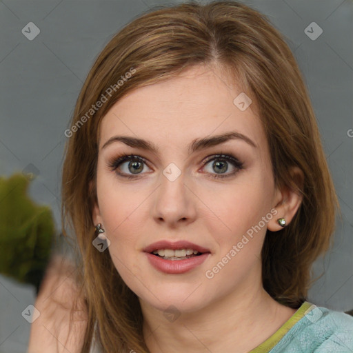 Joyful white young-adult female with medium  brown hair and green eyes